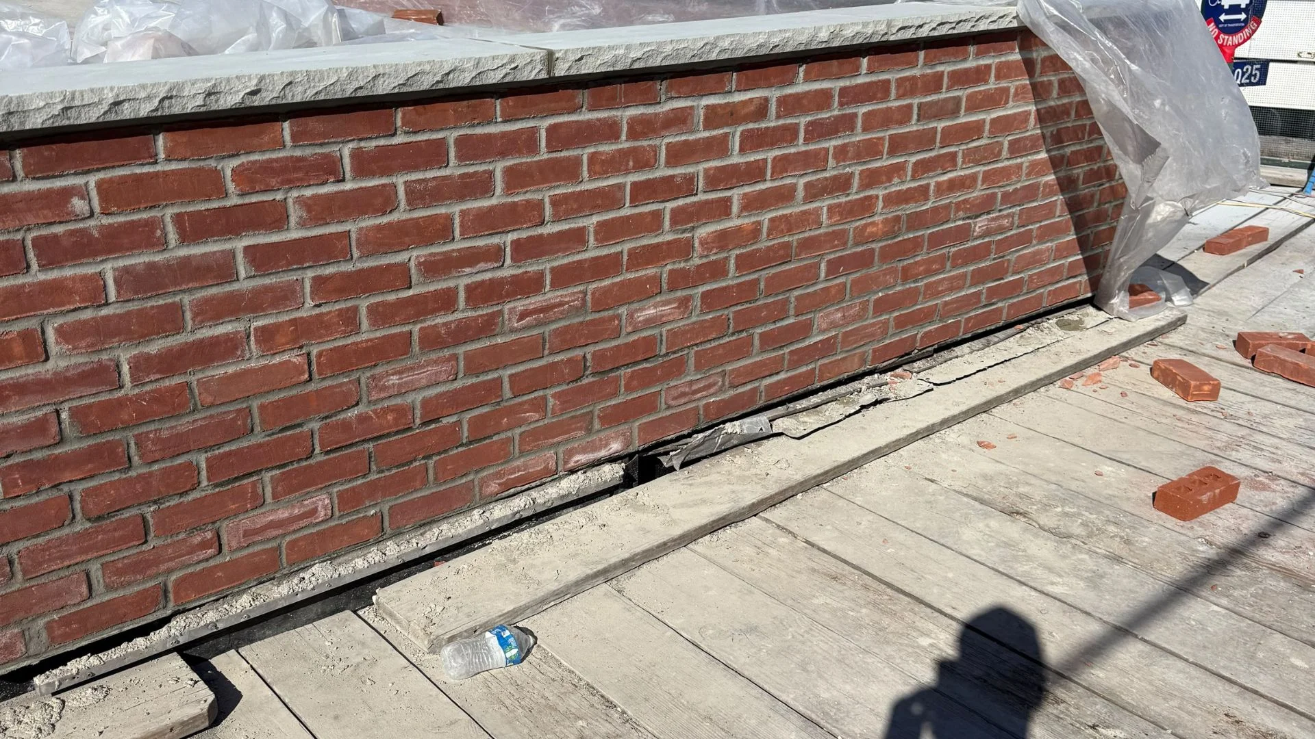 NYC Tuck Pointing masonry team working on a New York City building